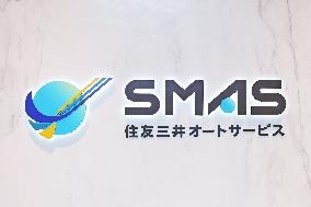 Sumitomo Mitsui Auto Service (SMAS) signboard and logo
